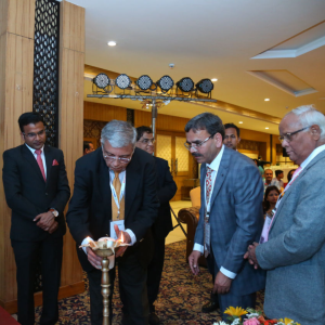Dr. Ashok Sarin, senior nephrologist from Apollo Hospital Delhi, lighting the ceremonial lamp at a medical conference